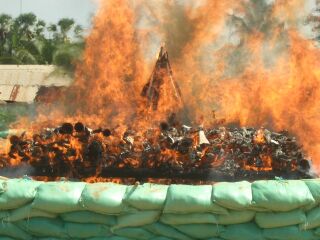 Weapons burning at a destruction ceremony in Kampong Thom Province