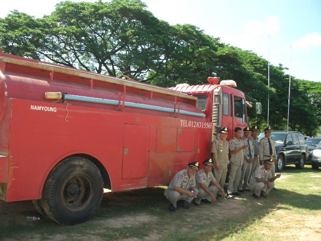 Fire fighting team stands by at the weapon destruction site